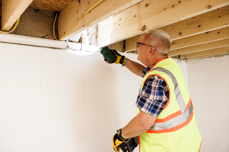 Plumber looking for leaks